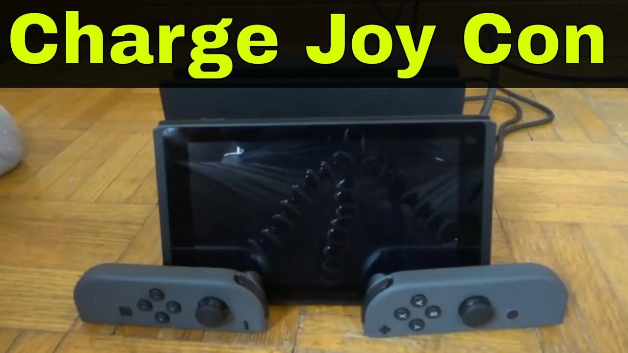 Australische persoon energie Airco Een Nintendo Switch-controller (joy con) opladen